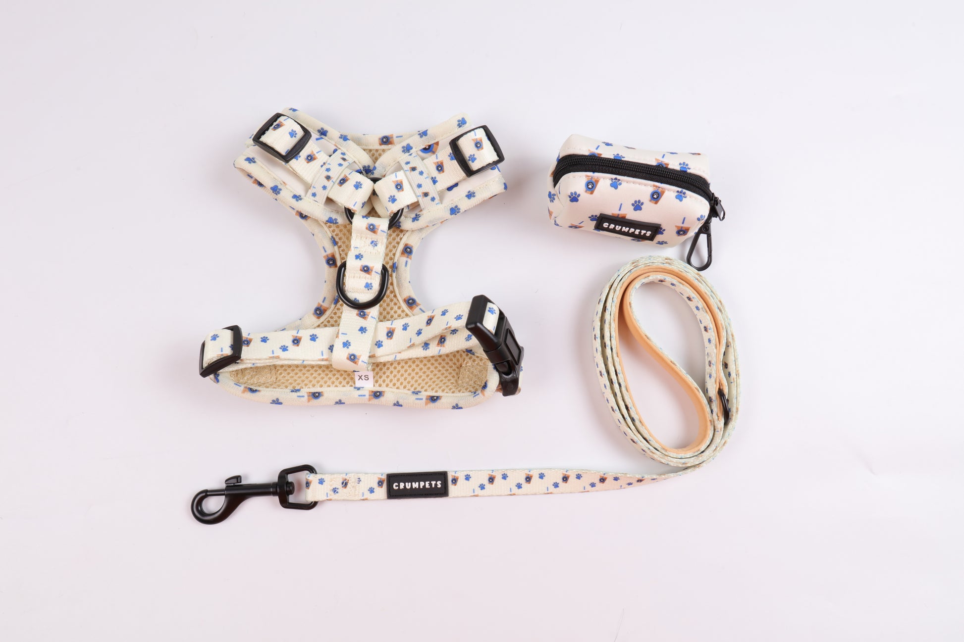 Crumpets Boutique - Treat your precious fur baby to walkies in café-chic fashion with our Puppachino bundle. The set includes a harness, lead, and waste bag holder sporting a delightful coffee cup pattern.